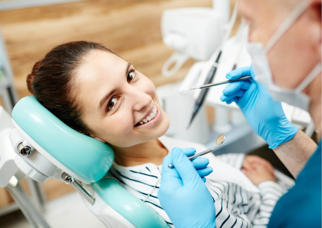 Patient undergoing a follow-up dental exam after root canal treatment to determine when it is safe to drive and resume normal activities.